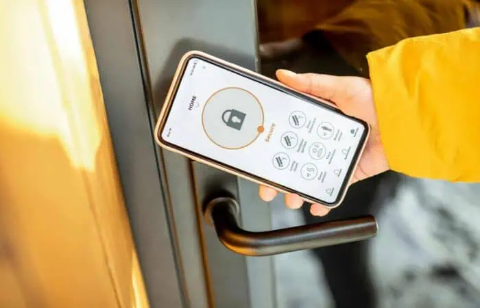 Locking entrance door with a smart phone